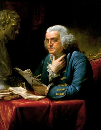 Painting of Benjamin Franklin reading a batch of papers next to a classical bust.